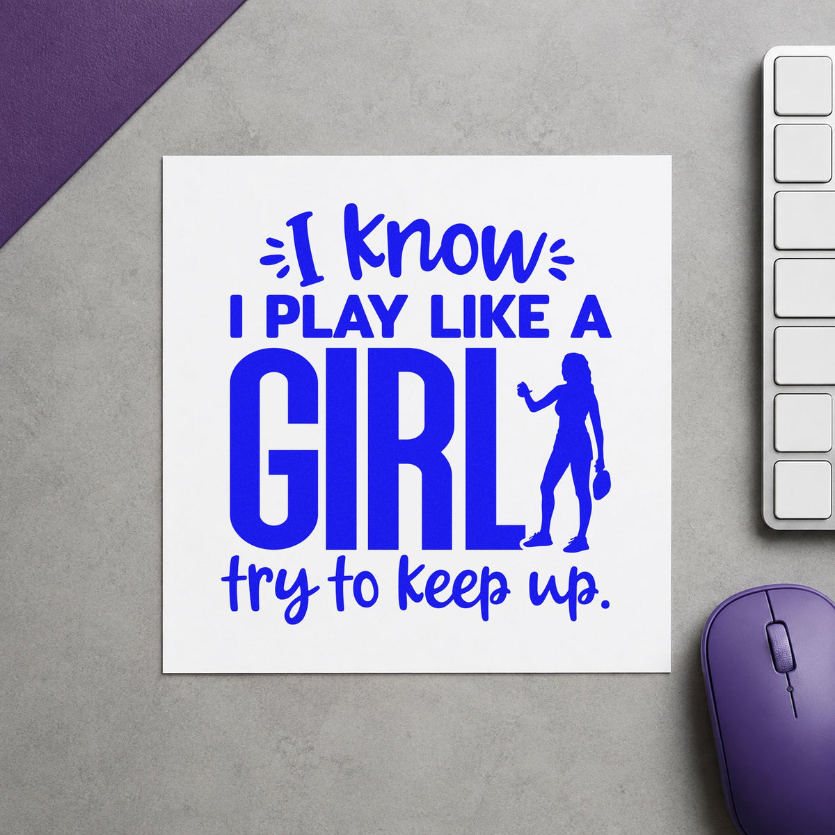 Play Like A Girl craft stamp in blue ink on cardstock, an easy option for warmup tee printing.