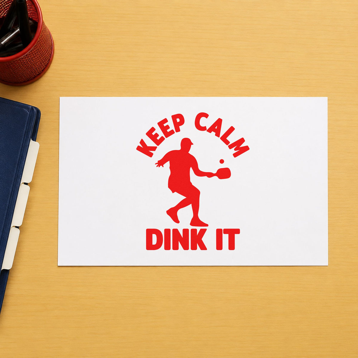 Keep Calm Dink It rubber stamp shown in red ink, stamped for projects such as bin event labels.