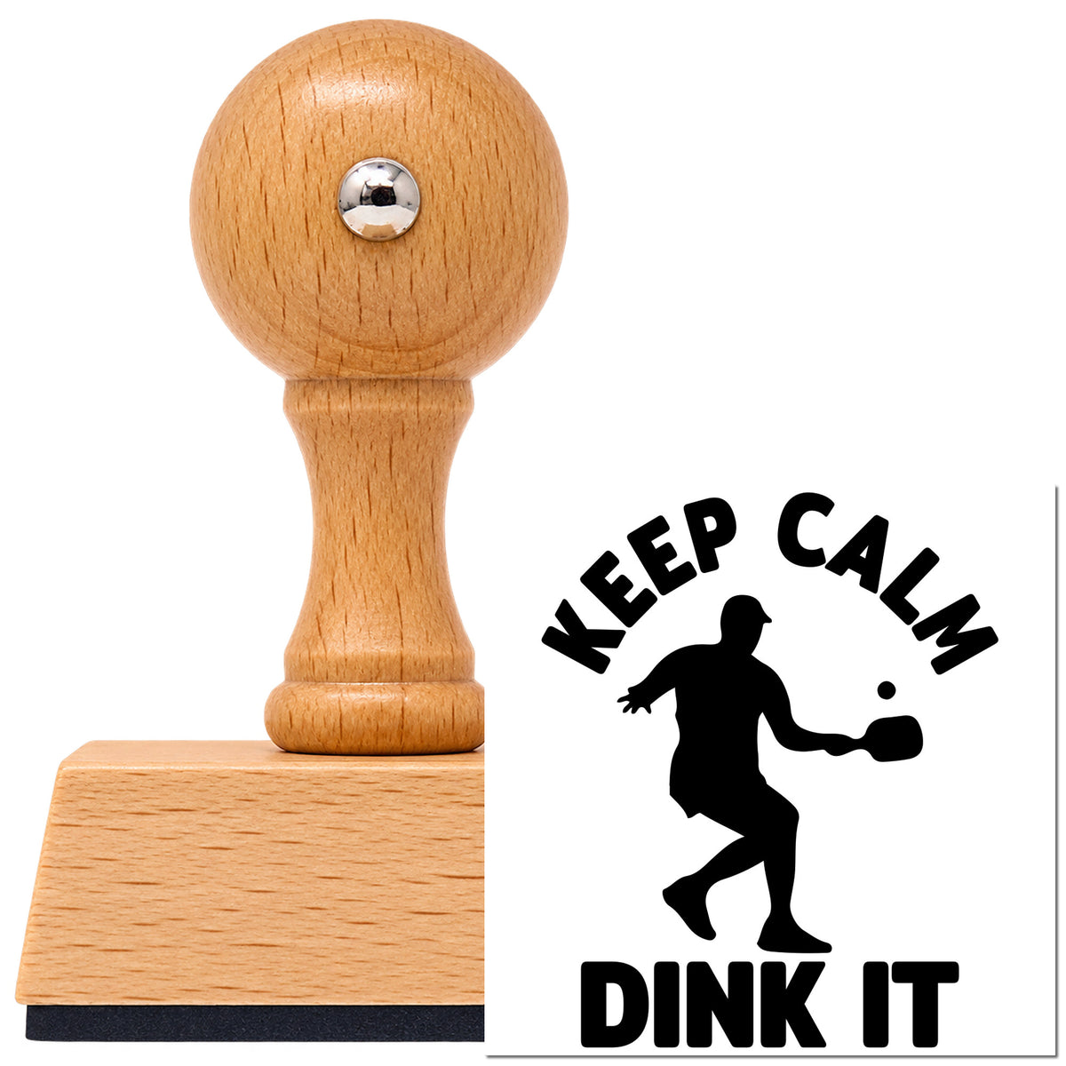 Keep Calm Dink It Paddle Vintage Pro rubber stamp in European beech wood with a round knob handle, shown beside its black imprint.