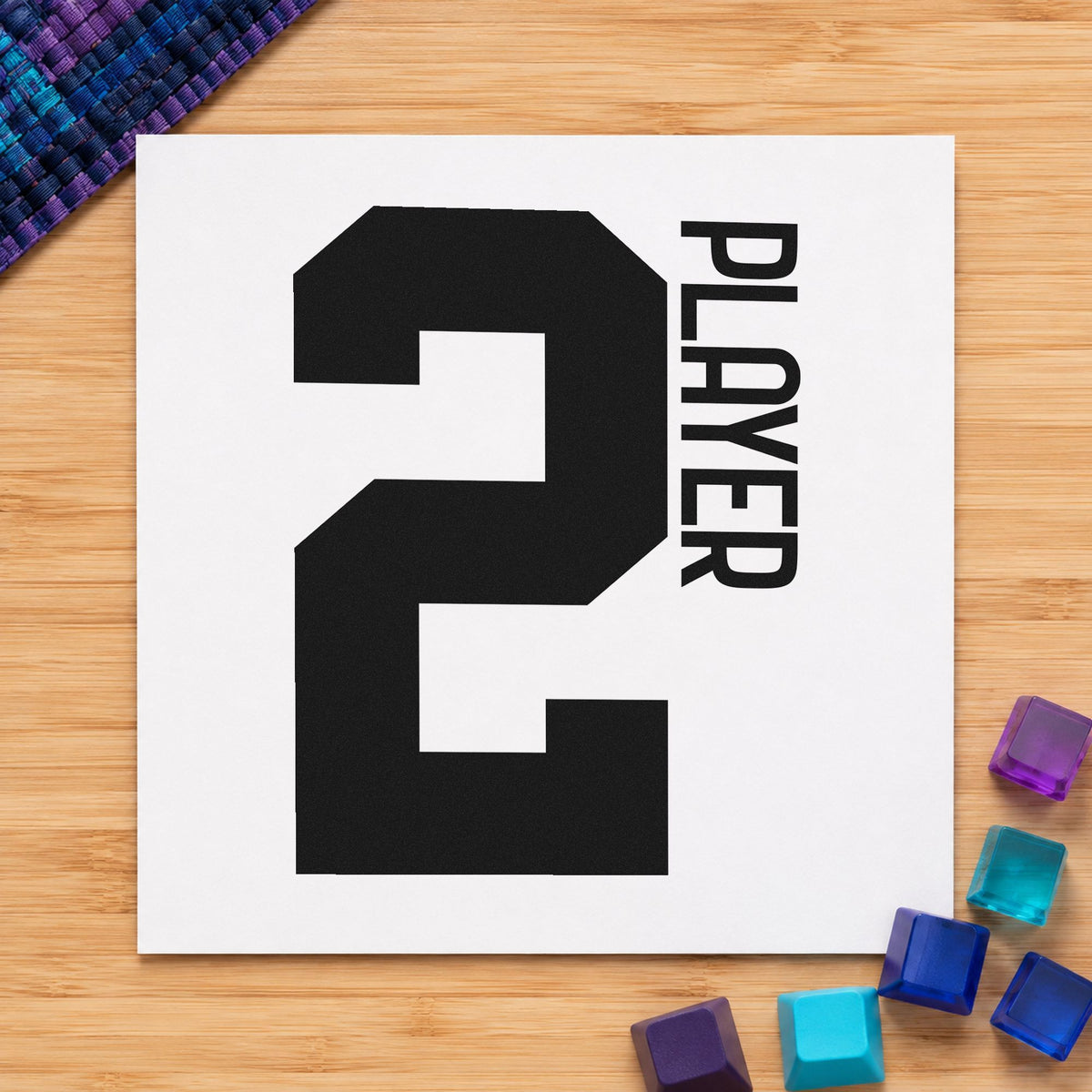 Player Two Bold Number craft stamp imprint in black ink on a handmade project, one idea being snack bowl gift tags.