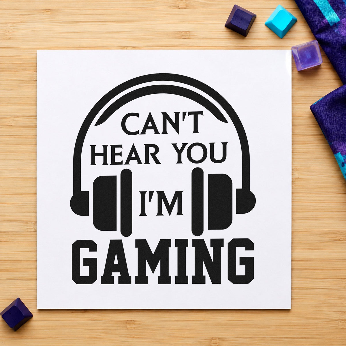 Cannot Hear You Gaming craft stamp imprint in black ink on a handmade project, one idea being headset gift tags.