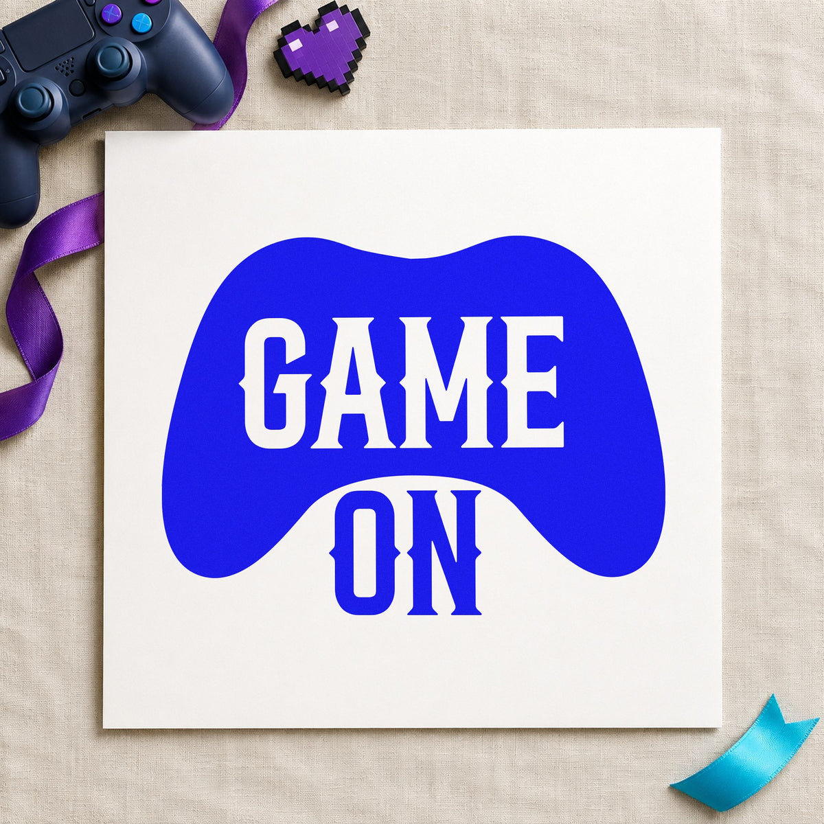 Game On Controller Silhouette craft stamp in blue ink on cardstock, an easy option for club tee printing.