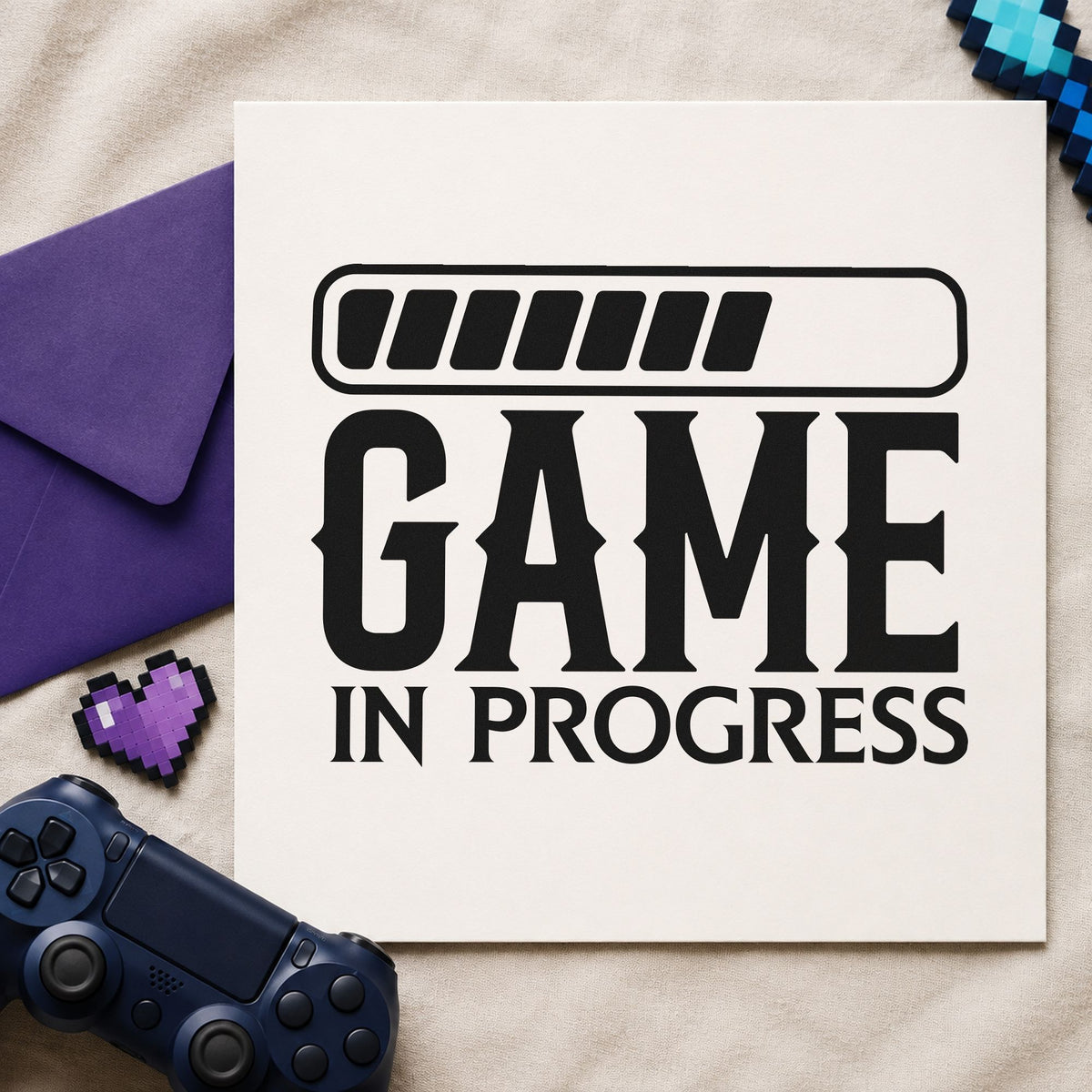 Game In Progress Loading craft stamp imprint in black ink on a handmade project, one idea being setup kit gift tags.