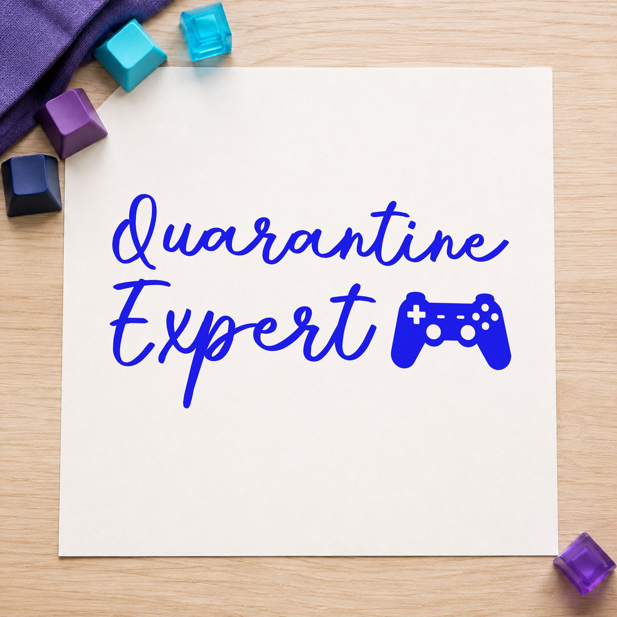 Quarantine Expert Gaming Controller craft stamp in blue ink on cardstock, an easy option for hoodie panel printing.