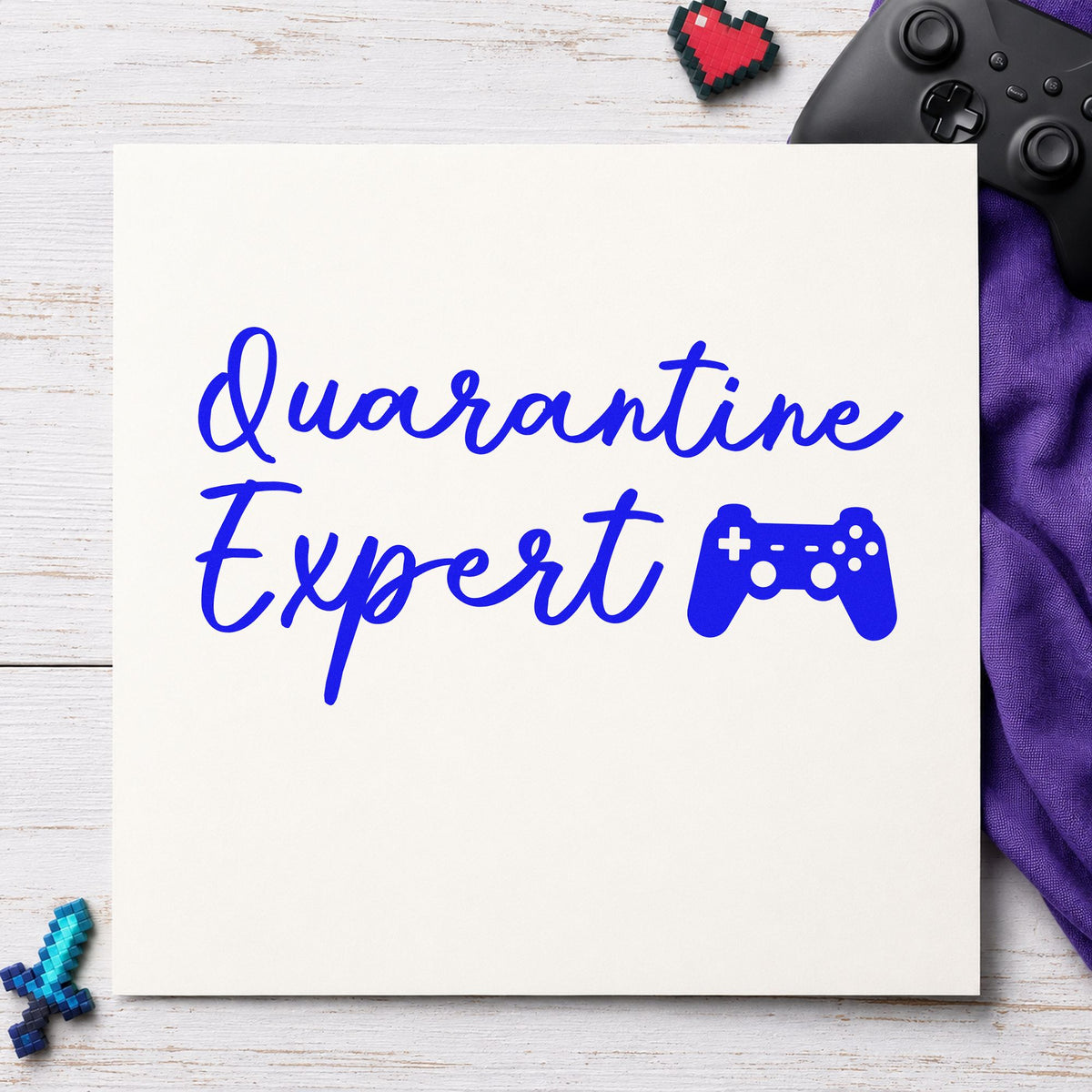 Quarantine Expert Gaming Controller craft stamp imprinted in blue ink on paper, a design suited to framed desk corner.