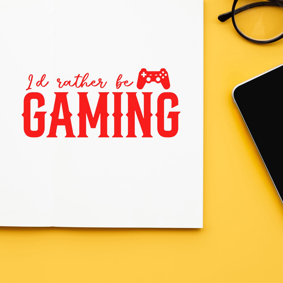 Rather Be Gaming Controller rubber stamp shown in red ink, stamped for projects such as desk year album page.