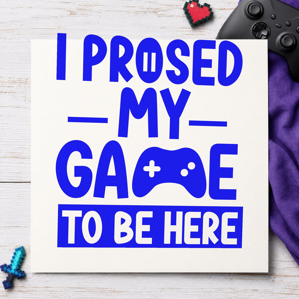 Gaming To Be Here craft stamp in blue ink on cardstock, an easy option for tie panel printing.