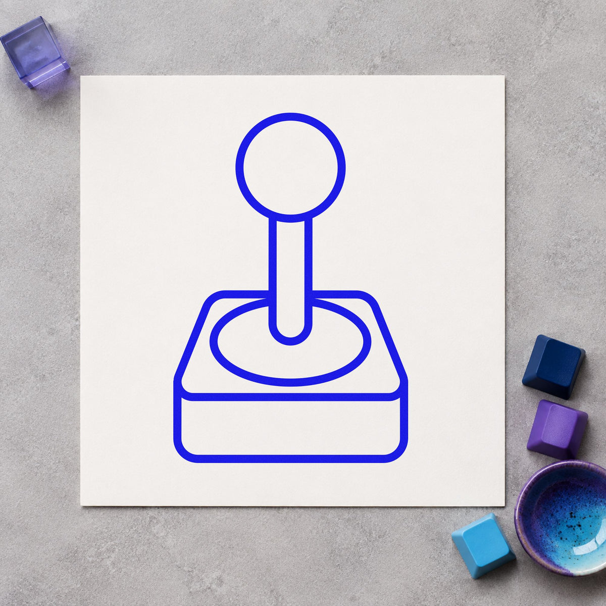 Retro Joystick Outline Graphic craft stamp in blue ink on cardstock, an easy option for work cloth printing.