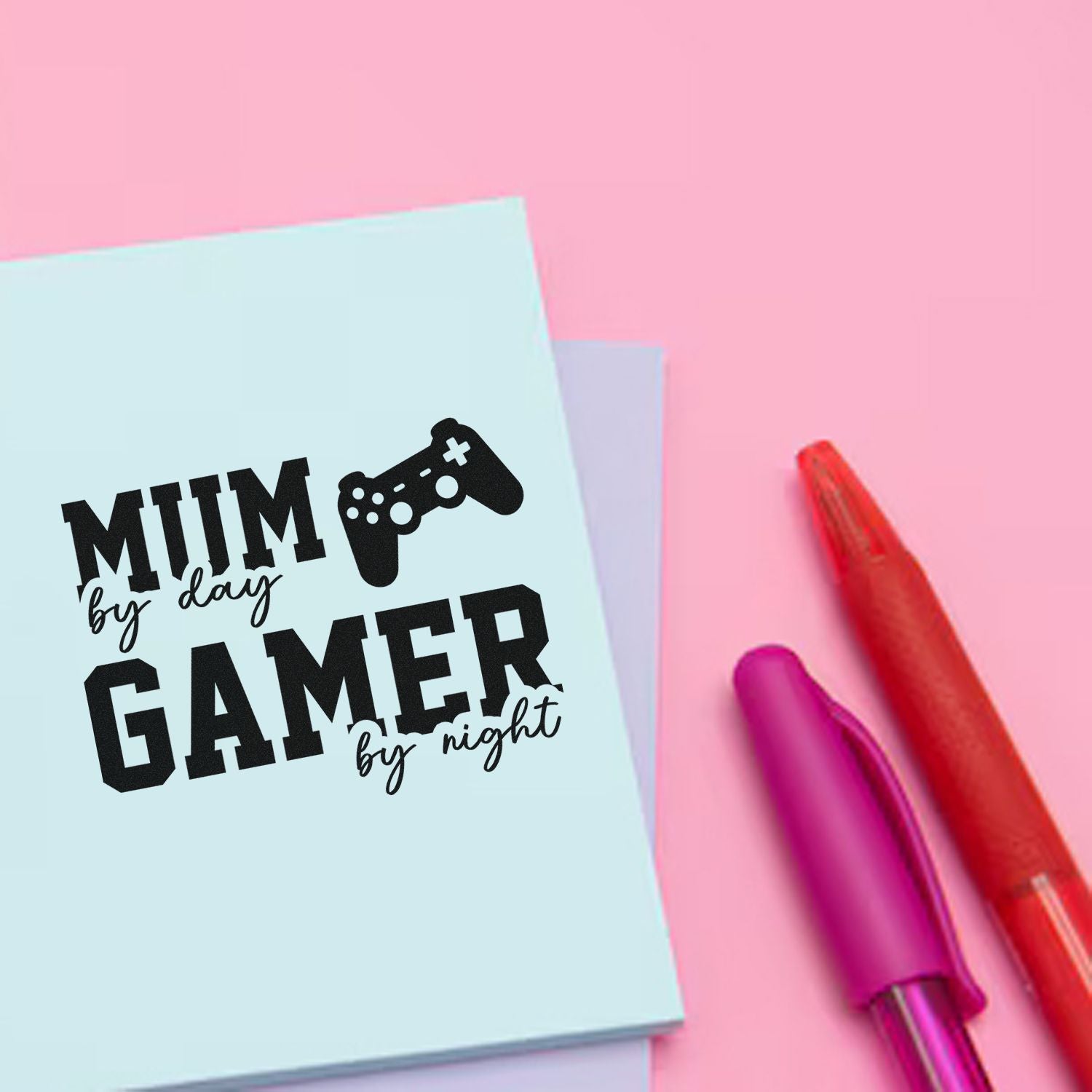 Mum by day gamer by night rubber stamp design with controller icon, perfect for custom craft and stationery stamping.