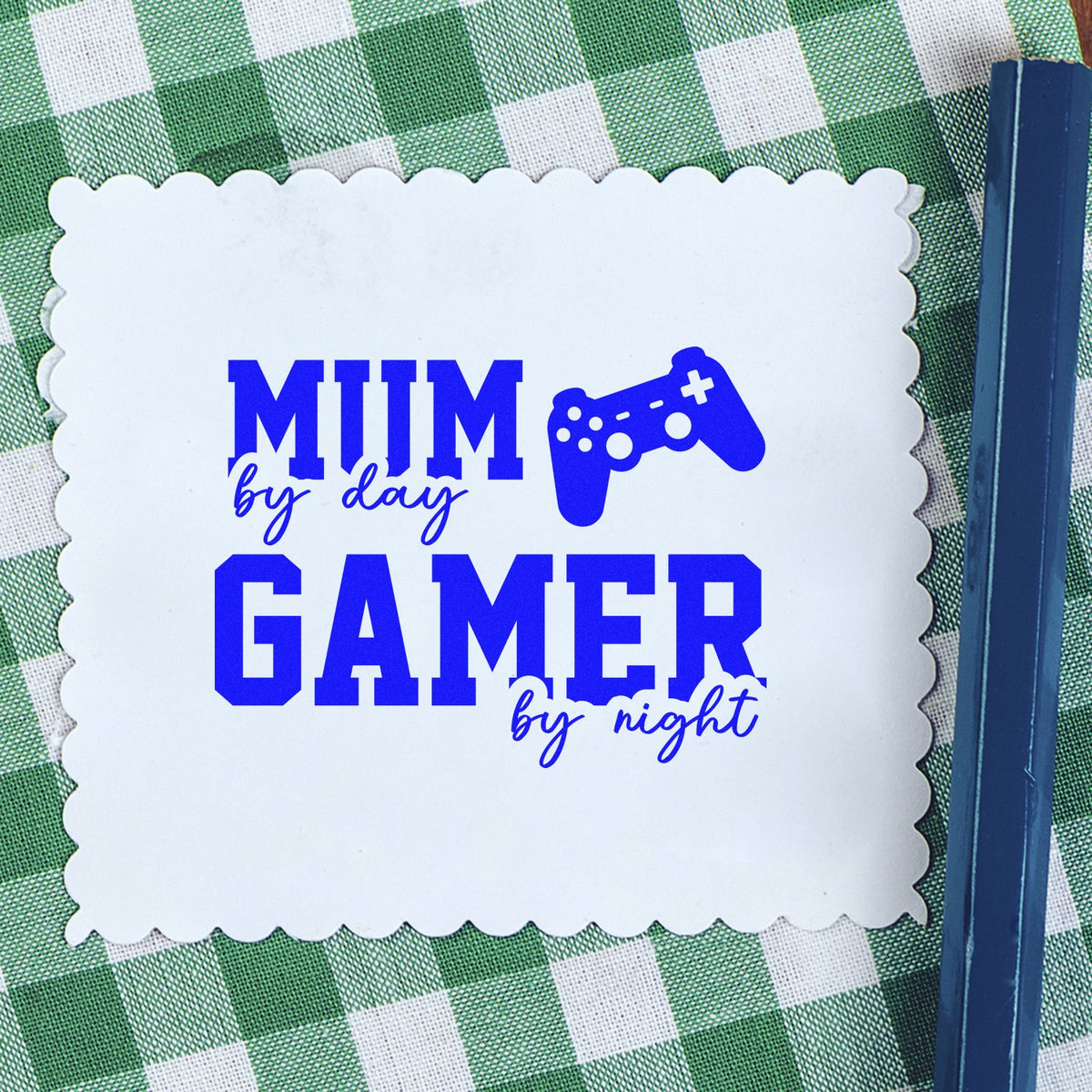 mom Day Gamer Night rubber stamp shown in blue ink, stamped for projects such as corner album page.