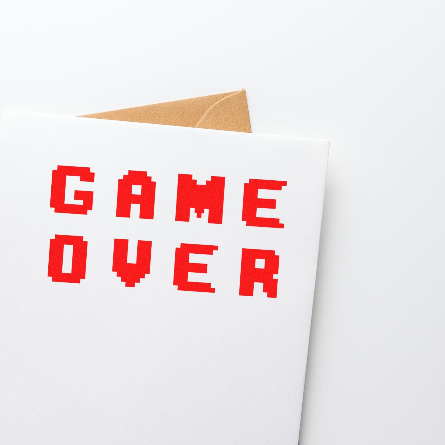 Game over rubber stamp design for cards, invitations, and creative crafting projects with a bold retro pixel style.