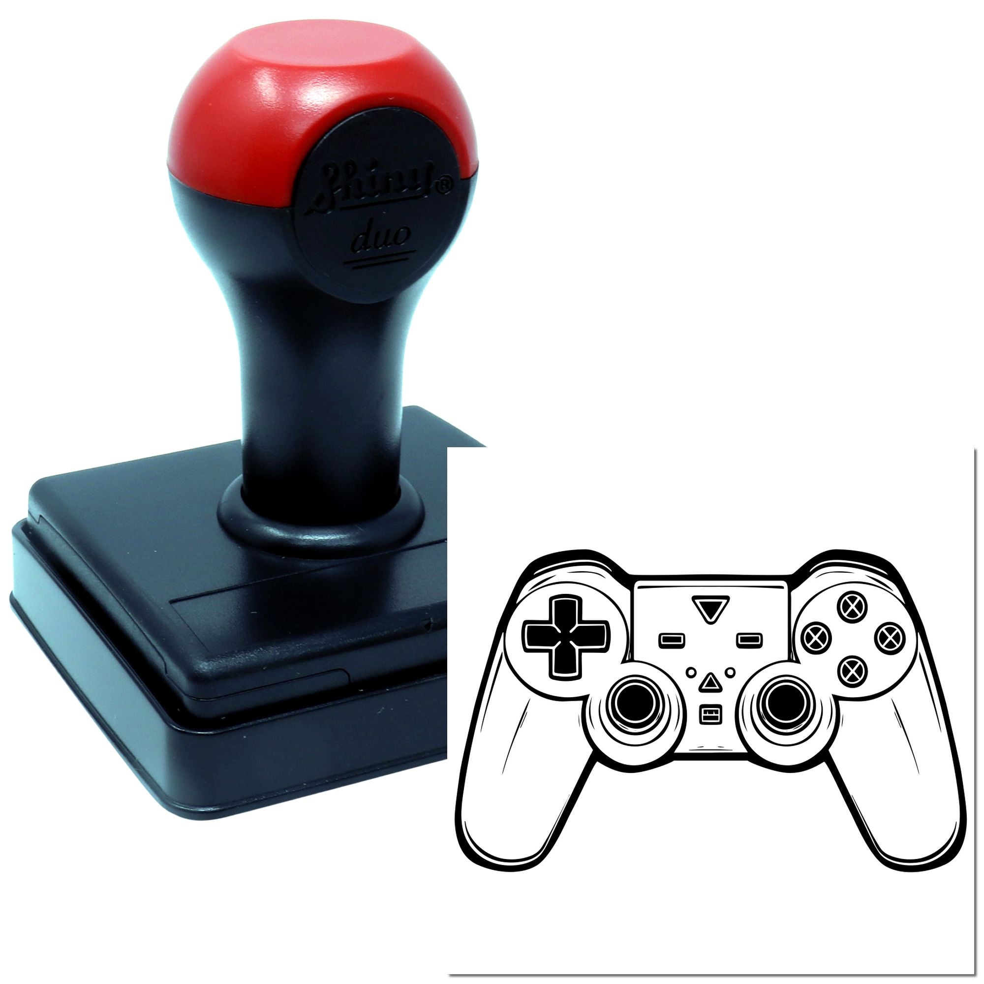 Self-inking rubber stamp with custom game controller design, shown as a branded stamp tool for gaming-themed impressions.