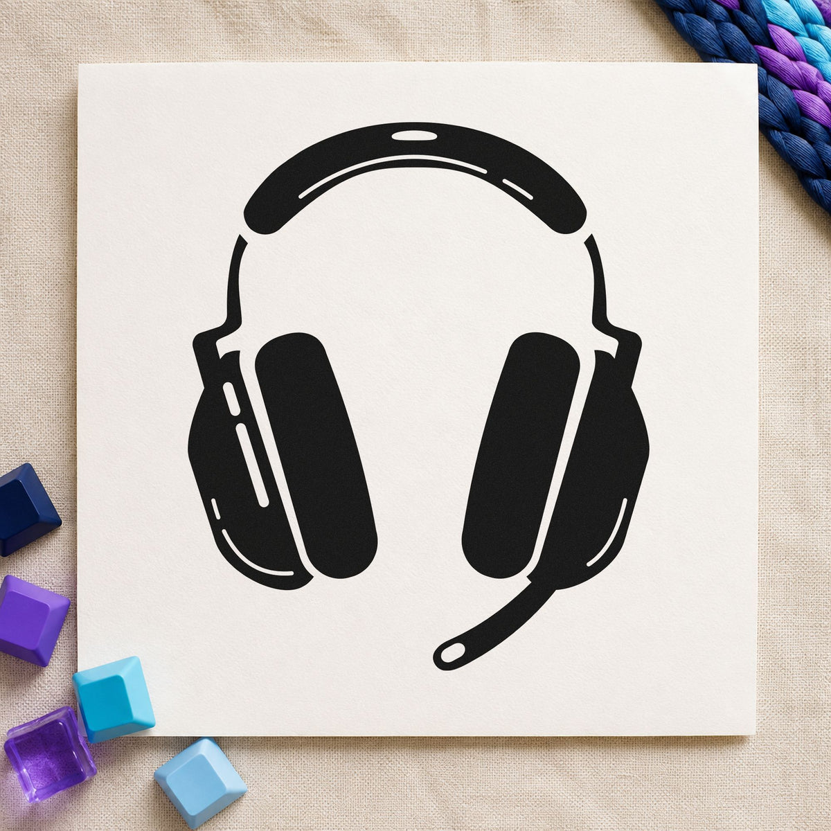 Gaming Headset With Microphone craft stamp imprint in black ink on a handmade project, one idea being headset gift tags.