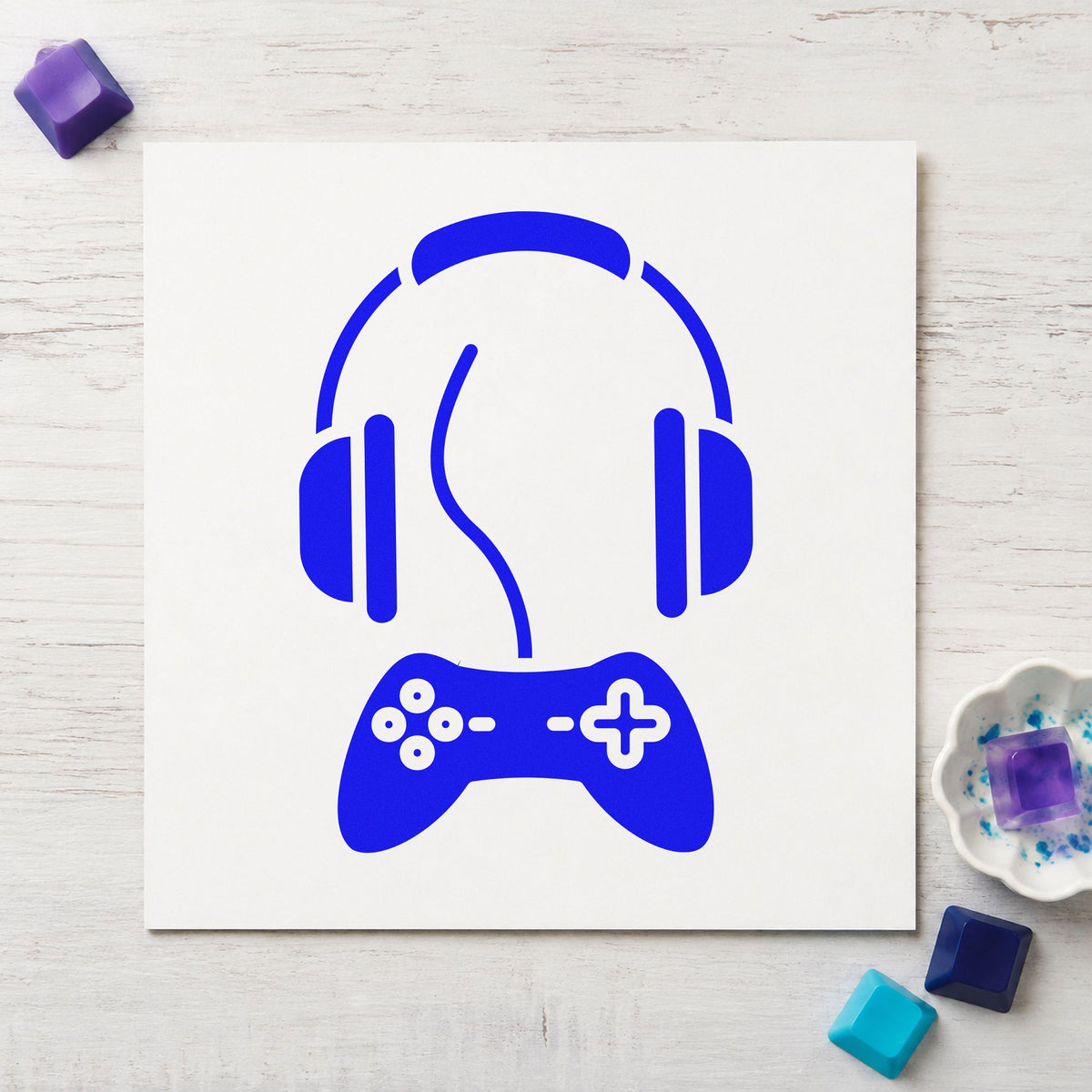 Headphones Above Wired Controller craft stamp in blue ink on cardstock, an easy option for mic cover printing.
