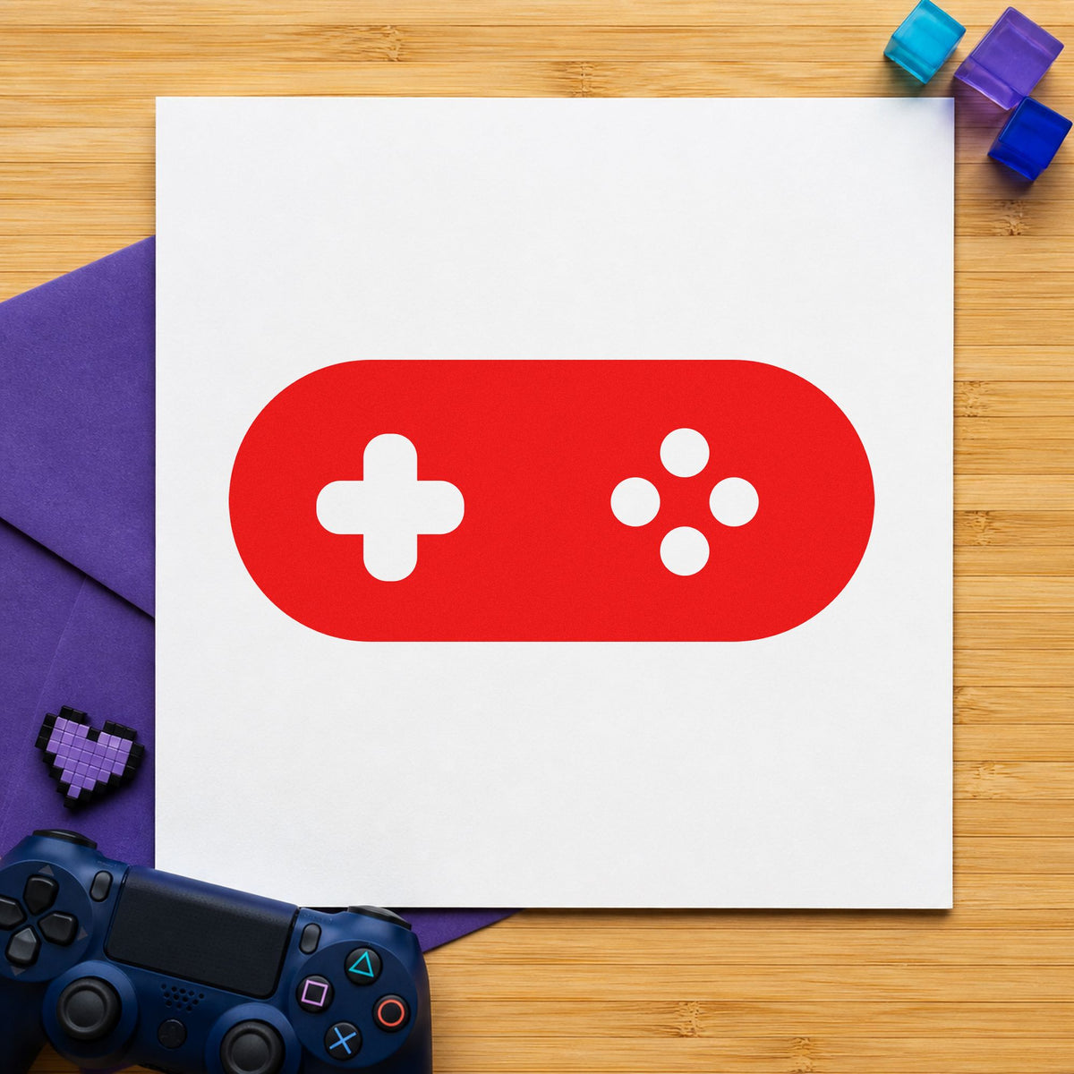 Rounded Retro Game Controller rubber stamp shown in red ink, stamped for projects such as bin token labels.
