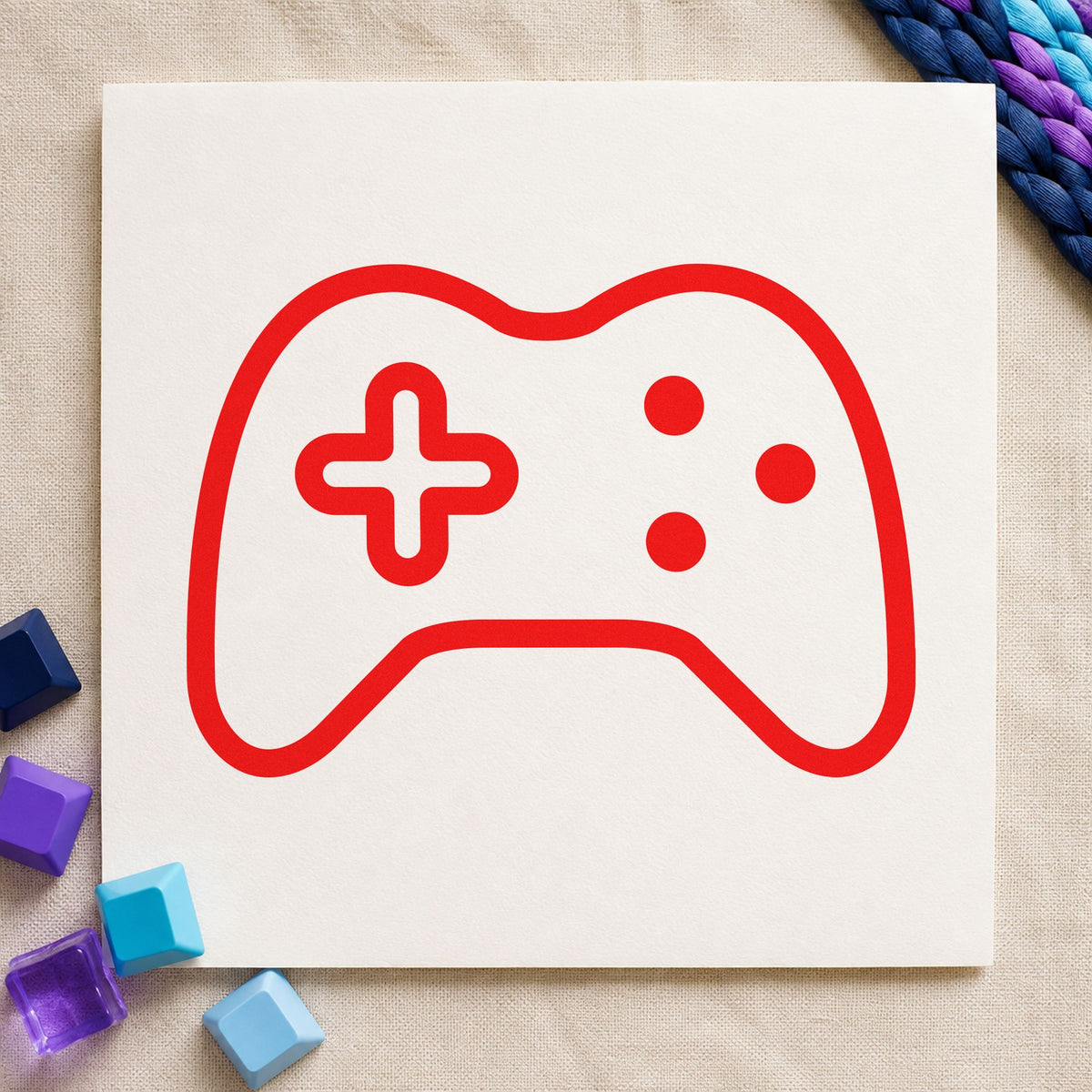 Three Button Controller Outline rubber stamp shown in red ink, stamped for projects such as bin game labels.