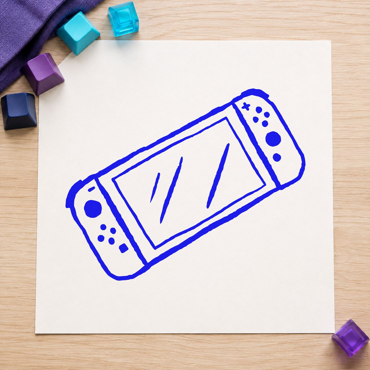 Handheld Gaming Console Outline craft stamp in blue ink on cardstock, an easy option for console pouch printing.