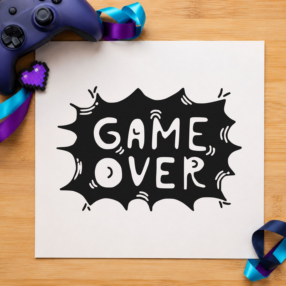 Game Over Comic Burst craft stamp imprint in black ink on a handmade project, one idea being guest favor tags.