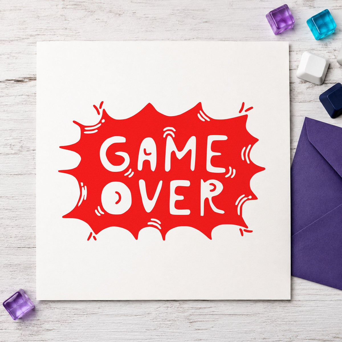 Game Over Comic Burst craft stamp imprint in red ink on a handmade project, one idea being next level cards.