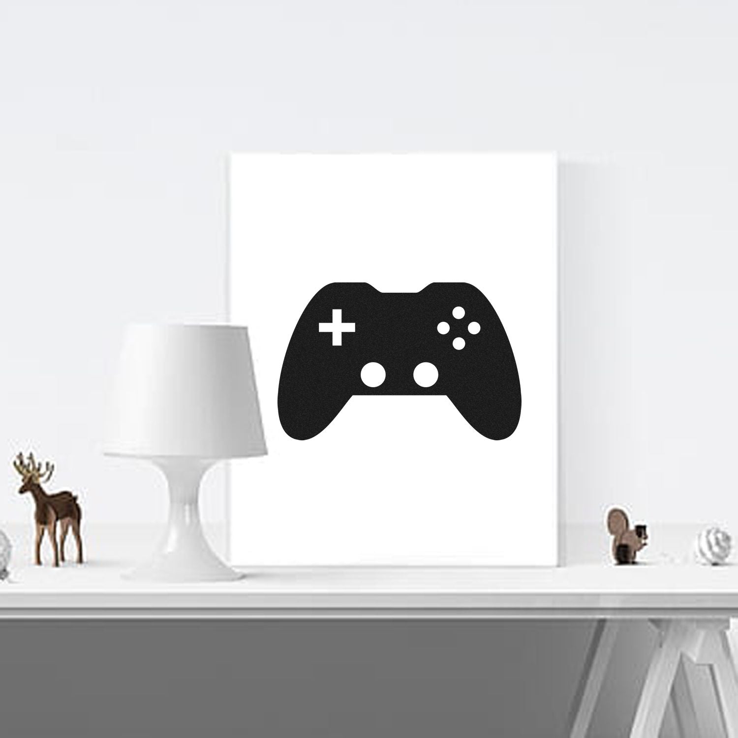 Game controller rubber stamp design with black video game icon for gamer-themed crafts, branding, and custom stamping.