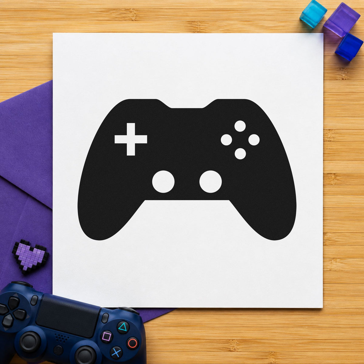 Solid Dual Stick Controller craft stamp imprint in black ink on a handmade project, one idea being entry wristband tags.