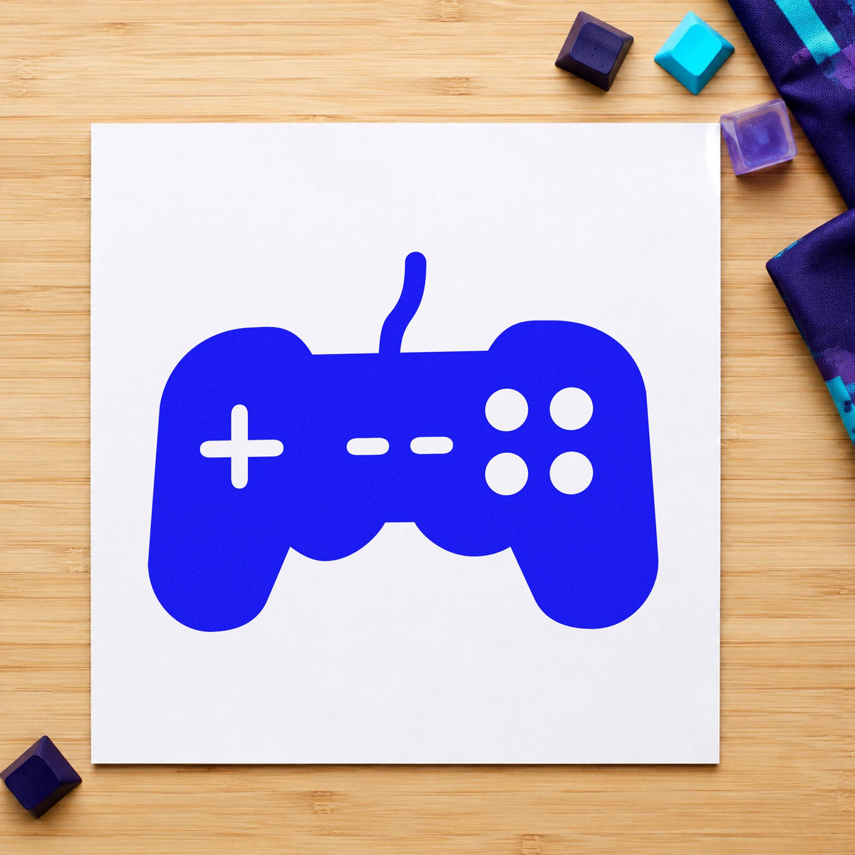 Wired Controller Button Graphic craft stamp imprinted in blue ink on paper, a design suited to framed drop point.