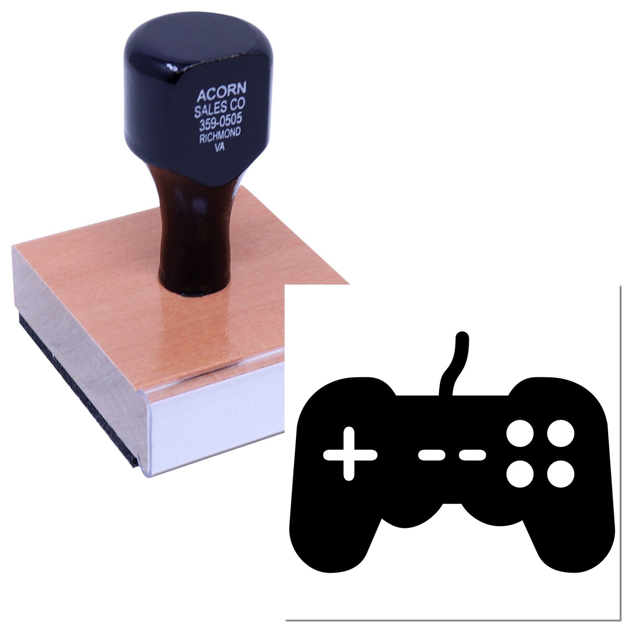 Custom rubber stamp with video game controller icon, shown mounted on a stamp handle for personalized branding.