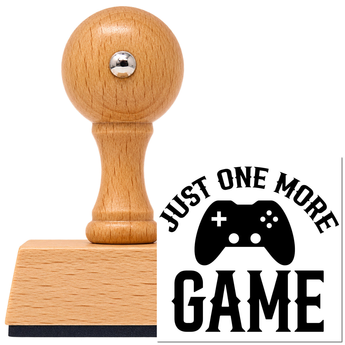 Just One More Game Controller Vintage Pro rubber stamp in European beech wood with a round knob handle, shown beside its black imprint.