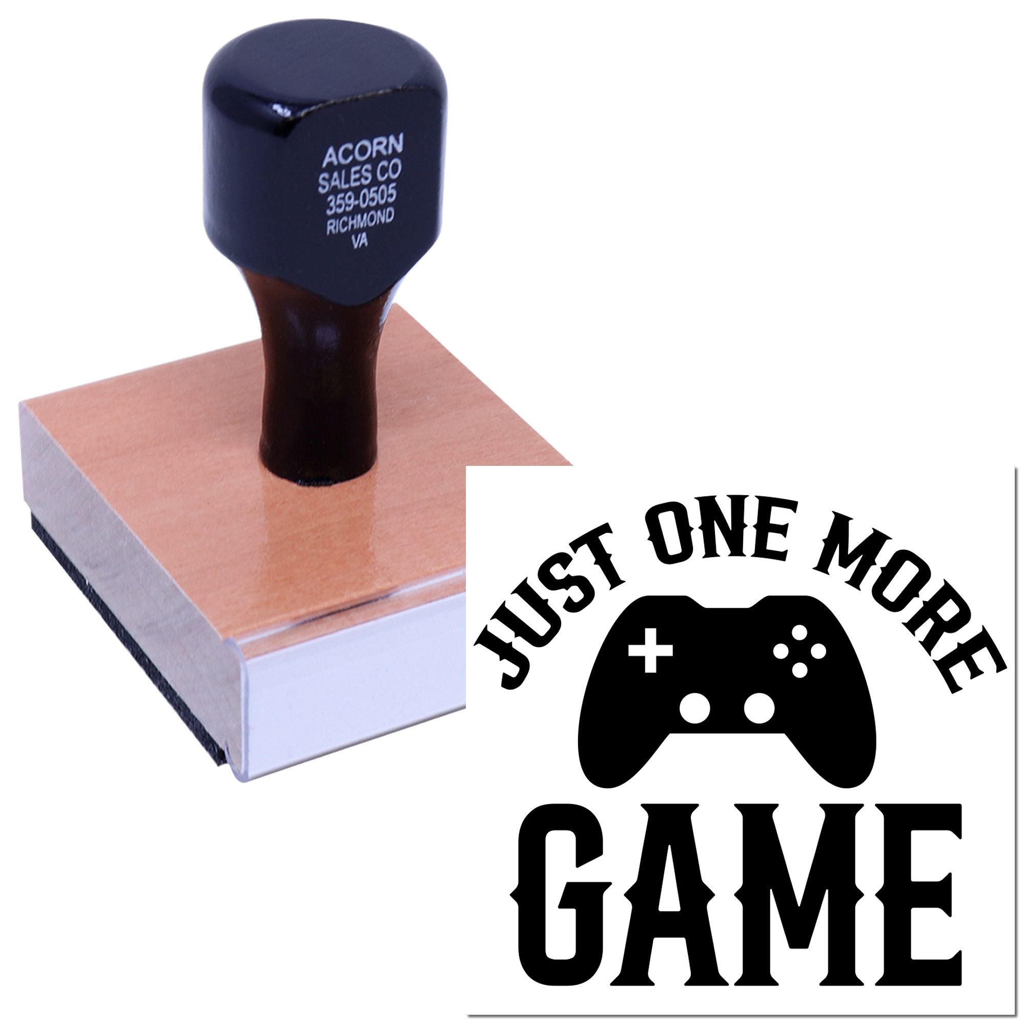 Custom rubber stamp with Just One More Game gaming logo on wooden block, ideal for gamer branding and personalized stamping.