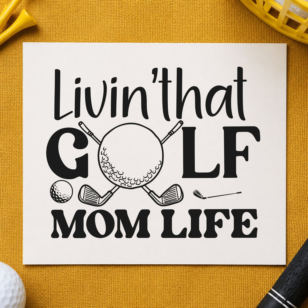 Living Golf Mom Life craft stamp imprint in black ink on a handmade project, one idea being snack bag gift tags.