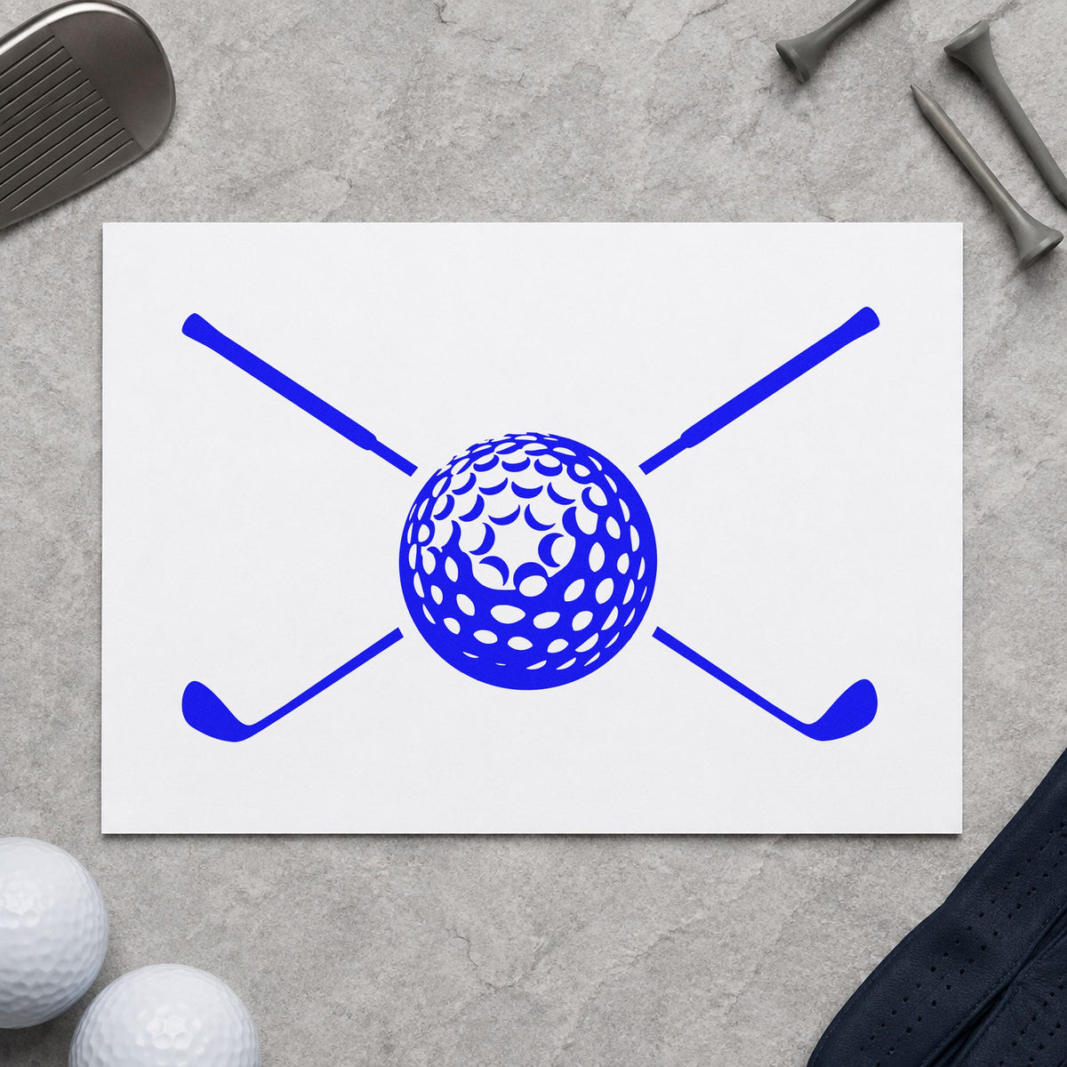 Golf Ball Crossed Clubs craft stamp in blue ink on cardstock, an easy option for bench cloth printing.