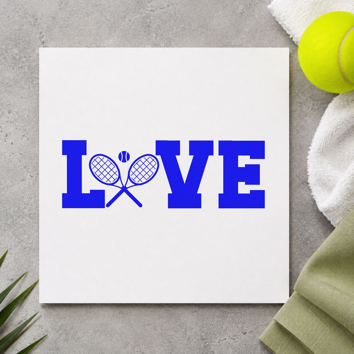 Love Crossed Tennis Rackets craft stamp imprinted in blue ink on paper, a design suited to framed club lounge.
