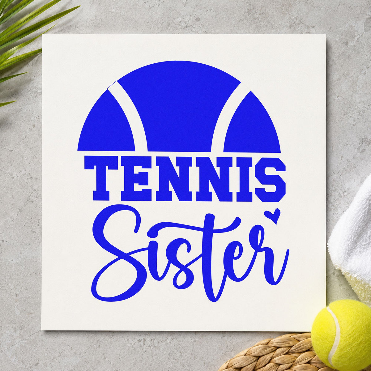 Tennis Sister Half Ball craft stamp imprinted in blue ink on paper, a design suited to framed bedroom shelf.