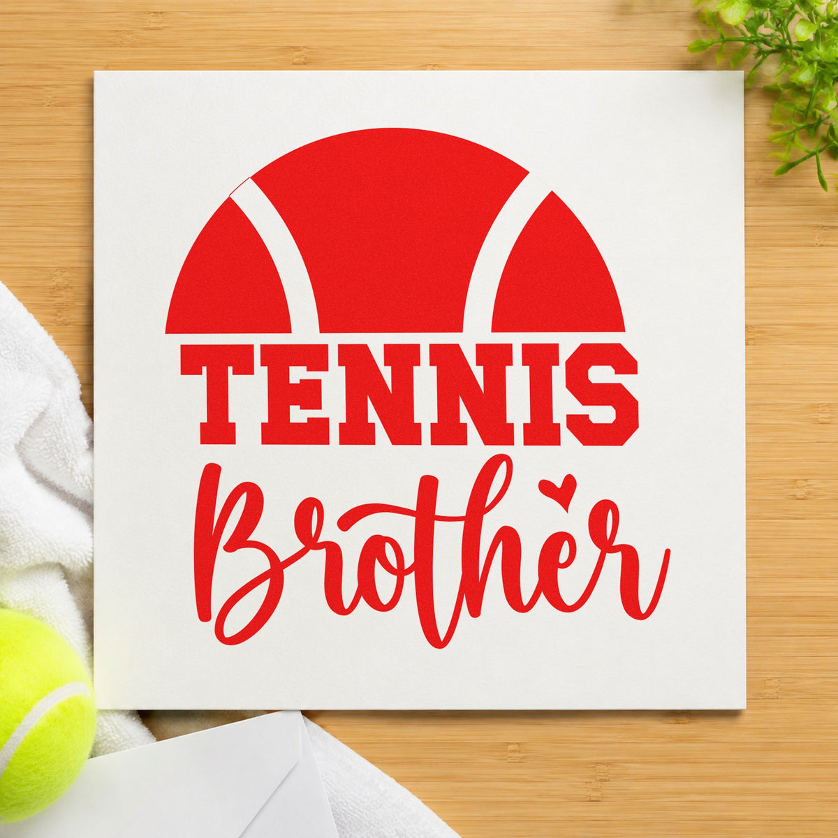 Tennis Brother Half Ball rubber stamp shown in red ink, stamped for projects such as bin towel labels.