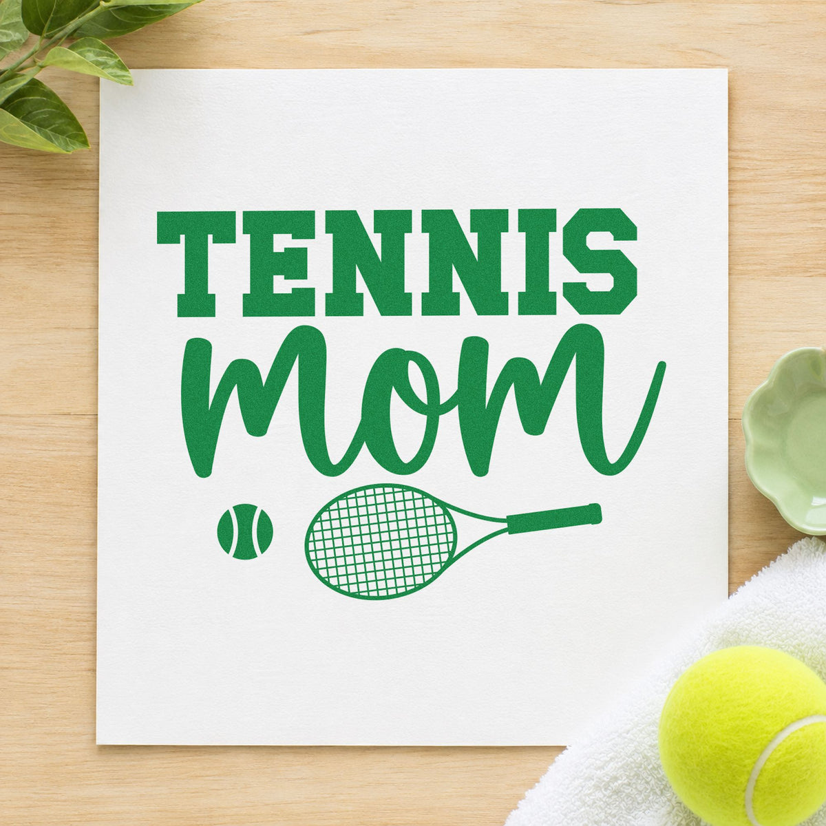 Tennis Mom Racket Ball craft stamp imprint in green ink on a handmade project, one idea being menu plan cards.