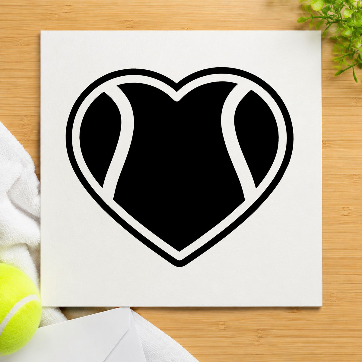 Tennis Ball Heart Outline craft stamp imprint in black ink on a handmade project, one idea being raffle prize gift tags.