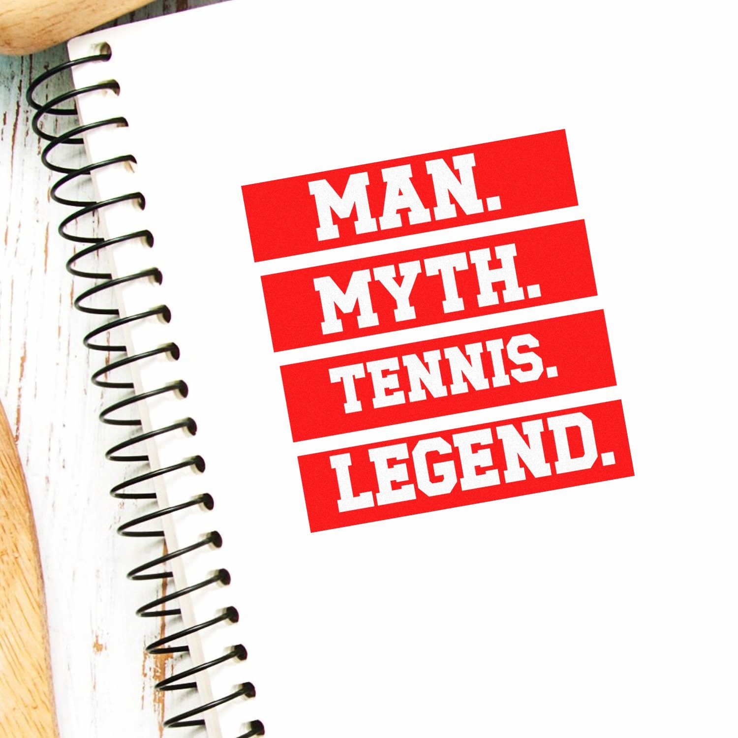 Tennis legend rubber stamp design with bold red Man. Myth. Tennis. Legend. text on notebook page.