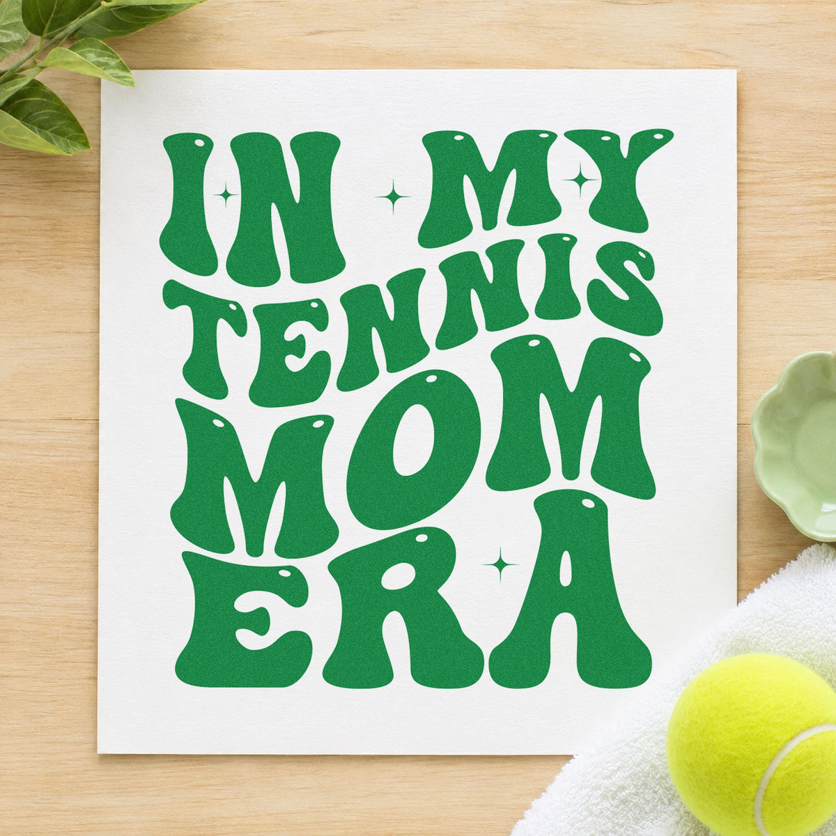 Tennis Mom Era Lettering craft stamp imprint in green ink on a handmade project, one idea being match plan cards.