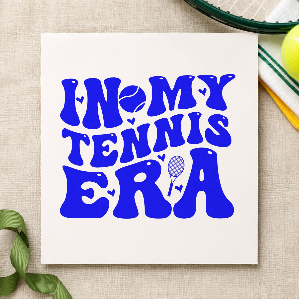 In My Tennis Era craft stamp in blue ink on cardstock, an easy option for kit bag printing.