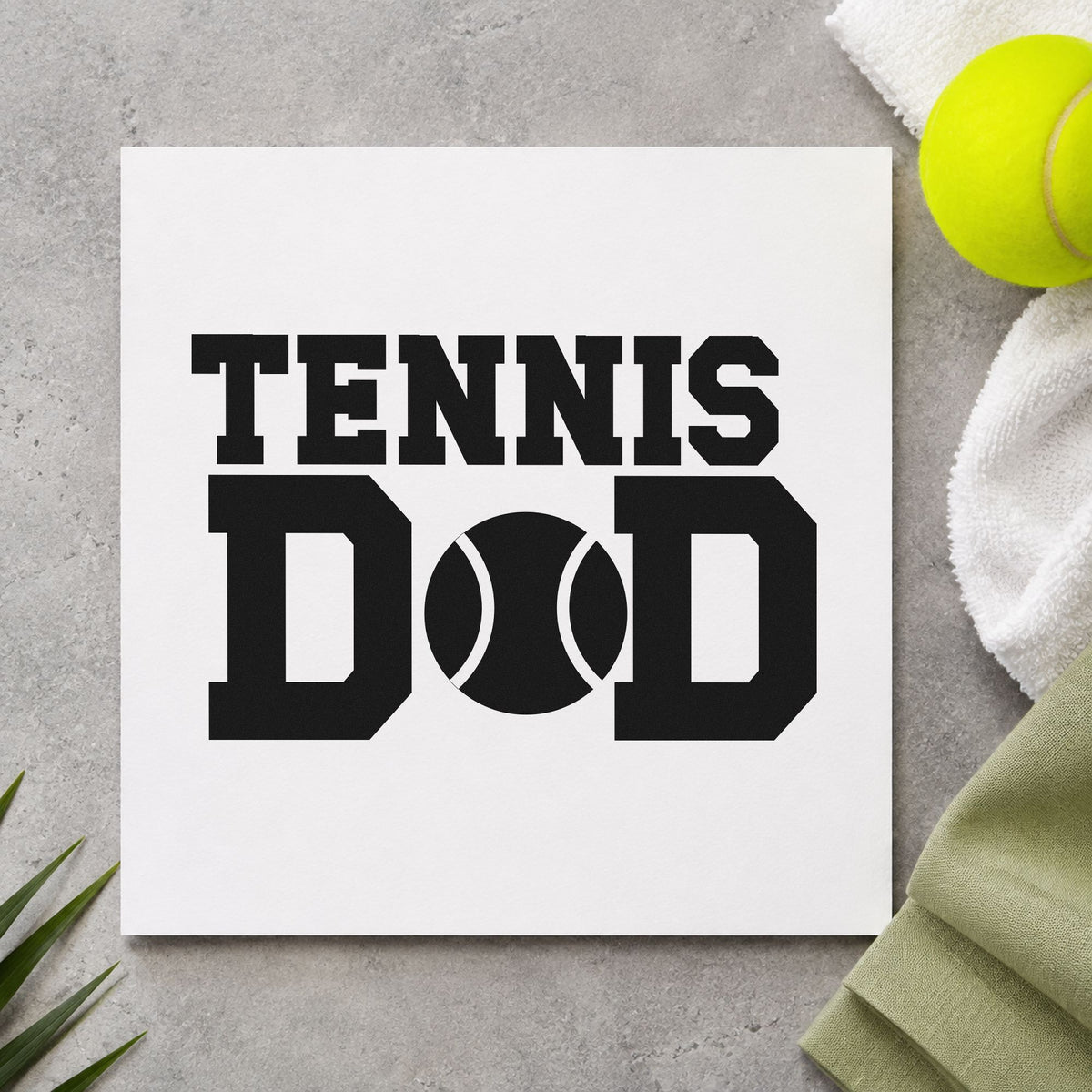 Tennis Ball Between D Letters craft stamp in black ink on cardstock, an easy option for backyard album page.