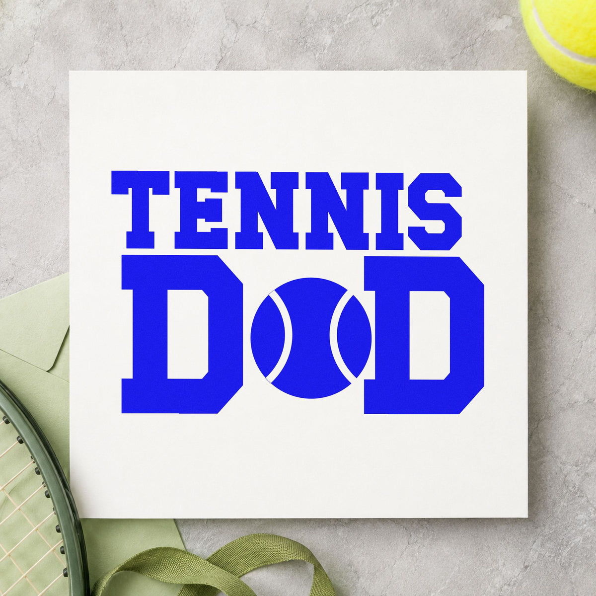 Tennis Ball Between D Letters craft stamp imprinted in blue ink on paper, a design suited to framed garage wall.