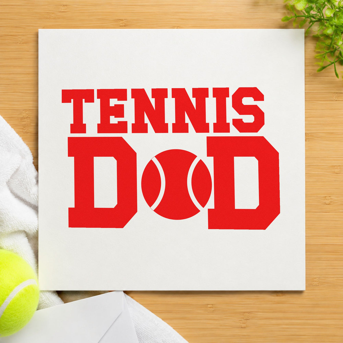 Tennis Ball Between D Letters rubber stamp shown in red ink, stamped for projects such as bin ball labels.
