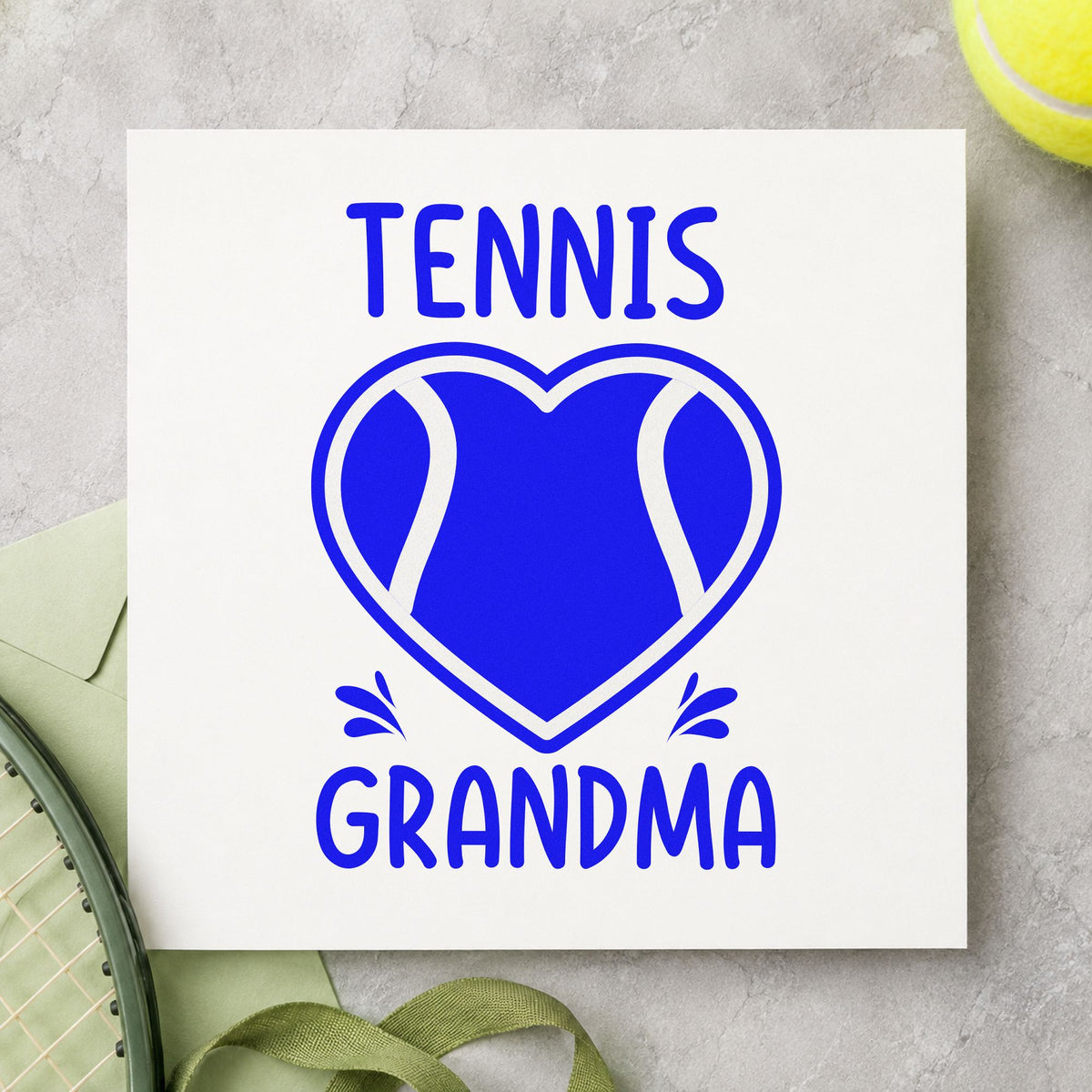 Tennis Grandma Heart Ball craft stamp imprinted in blue ink on paper, a design suited to framed living shelf.