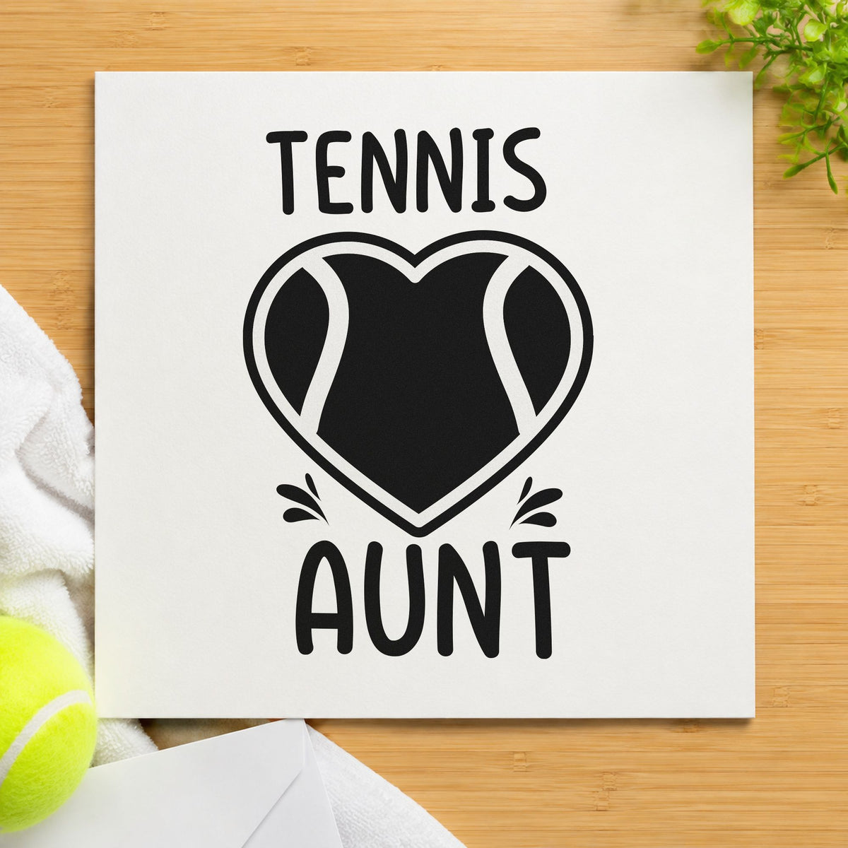 Tennis Aunt Heart Ball craft stamp imprint in black ink on a handmade project, one idea being travel gift tags.