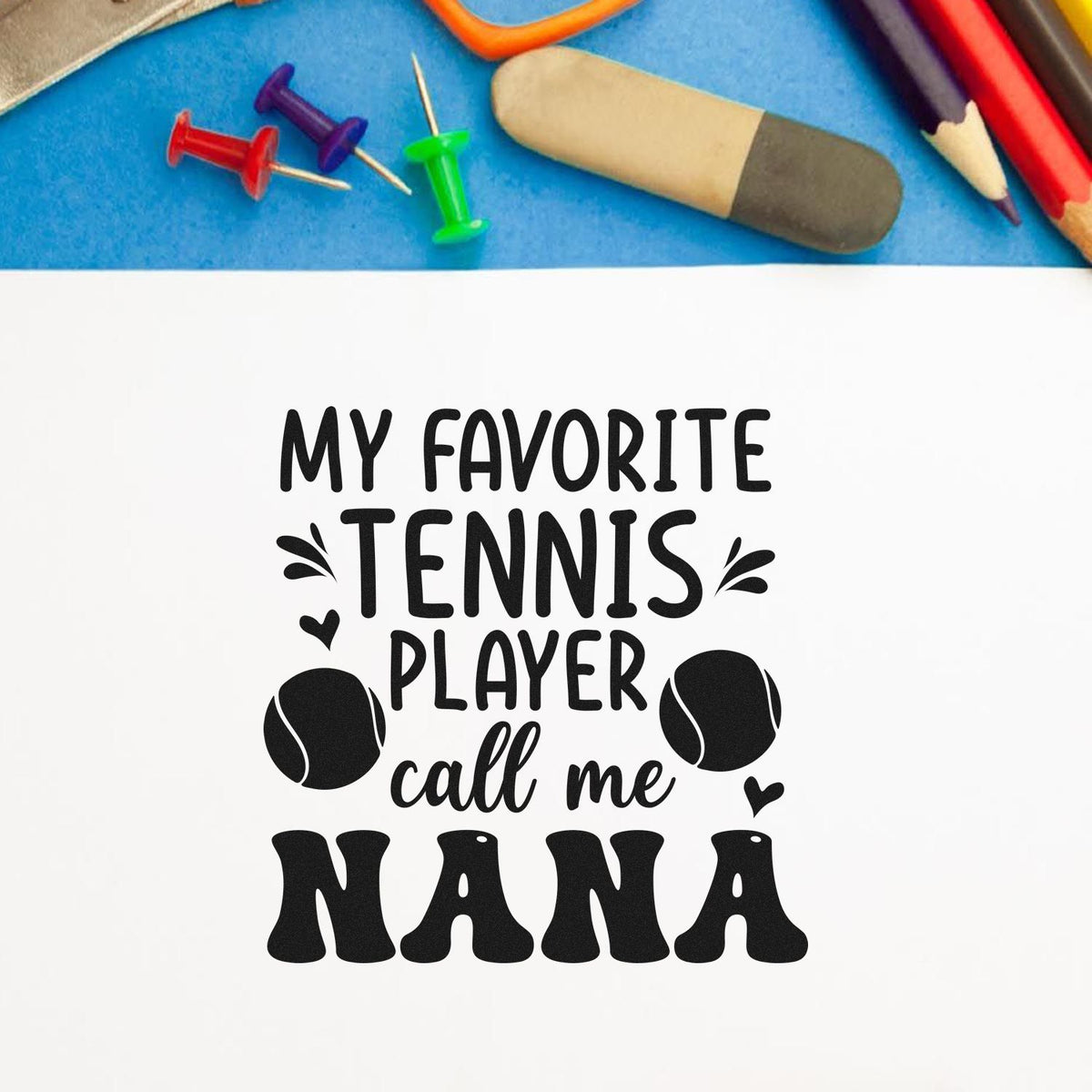 Favorite Tennis Player Nana Premium Wood-Mounted Stamp - Vintage Pro imprint stamped in black ink. MY FAVORITE TENNIS PLAYER call me NANA appears with tennis balls, hearts, and accent strokes.
