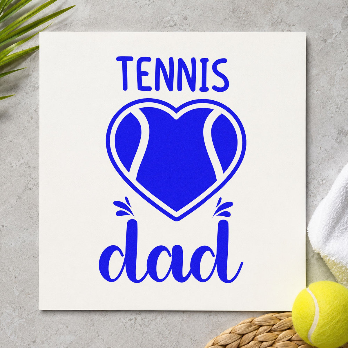 Tennis Dad Heart Ball craft stamp imprinted in blue ink on paper, a design suited to framed garage shelf.