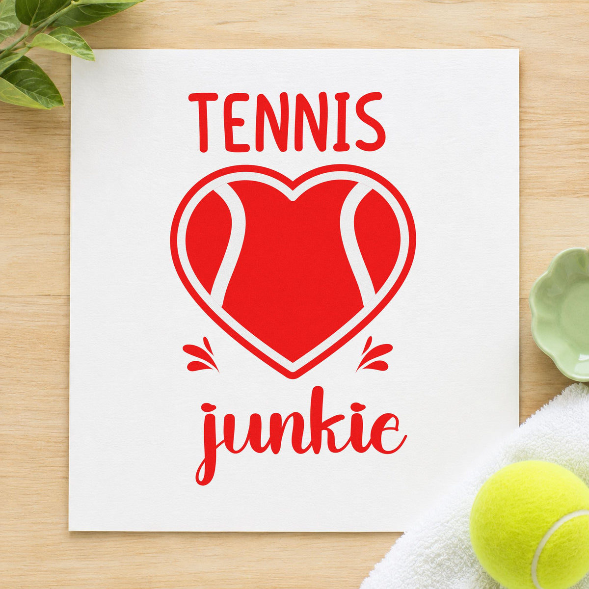 Tennis Junkie Heart Ball craft stamp imprint in red ink on a handmade project, one idea being drill focus cards.