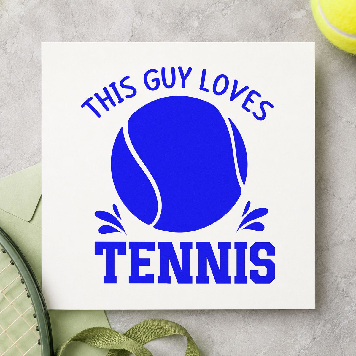 This Guy Loves Tennis craft stamp imprinted in blue ink on paper, a design suited to framed hall hook.