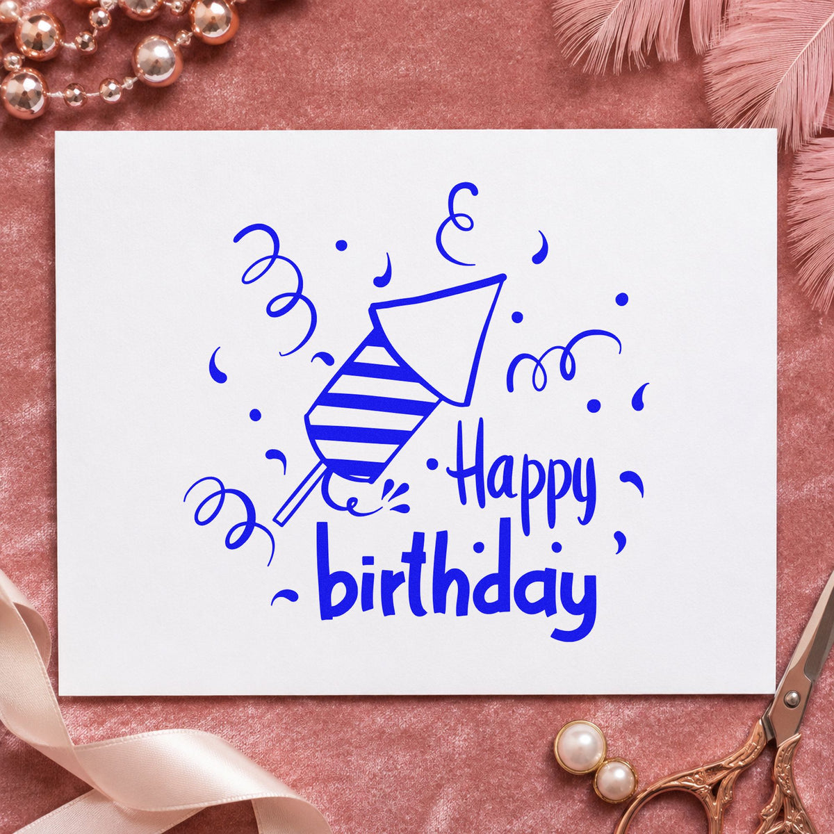 Birthday Party Horn Confetti craft stamp imprinted in blue ink on paper, a design suited to framed guest table.