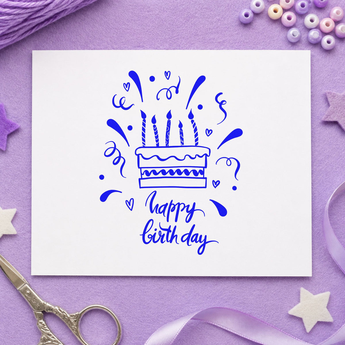 Birthday Candle Cake Confetti craft stamp in blue ink on cardstock, an easy option for break room printing.
